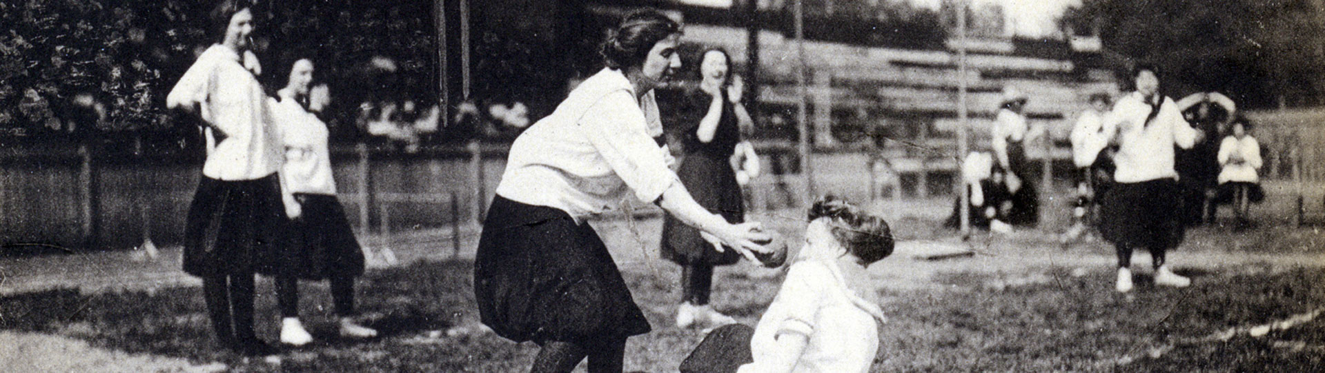 Photo of students playing ball from archives and special collections