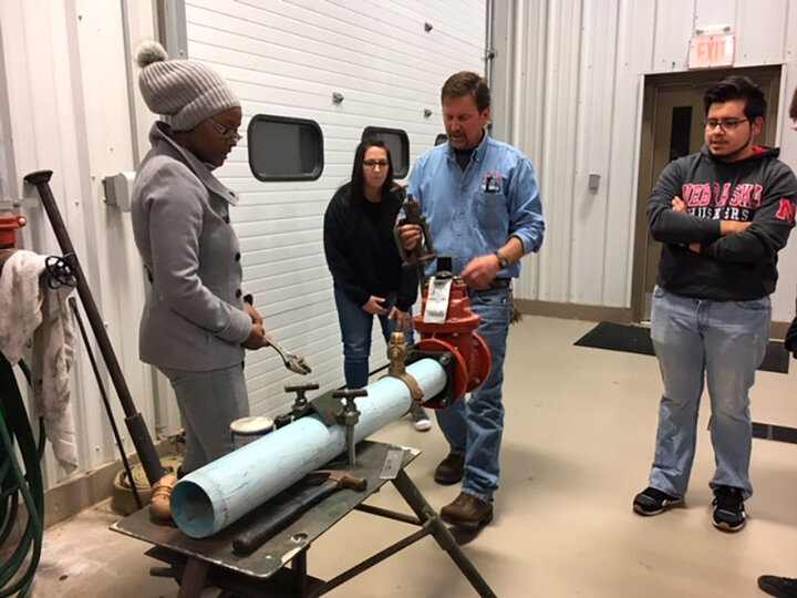 Learning to tap a drinking water main