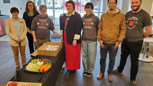 Members of the research team and Libraries dean