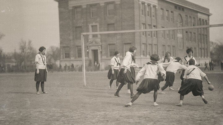 Female students at the University of Nebraska play soccer in 1924 on the lawn where Love Library now sits.