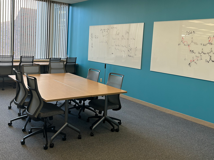 chairs, tables and wall whiteboards