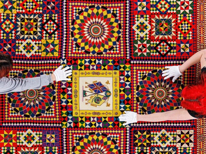 Top view of students working on a quilt