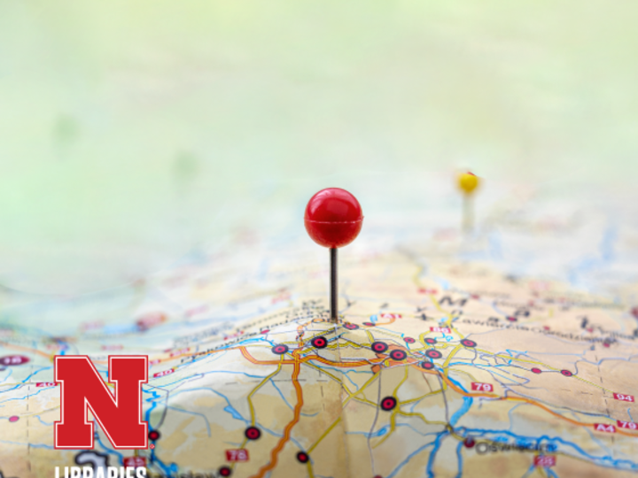 photo of a map with a pin