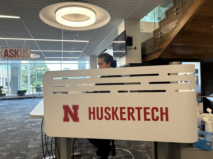 Huskertech sign on desk