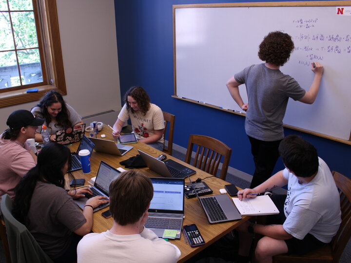 Photo of students in a Love Library Study room.