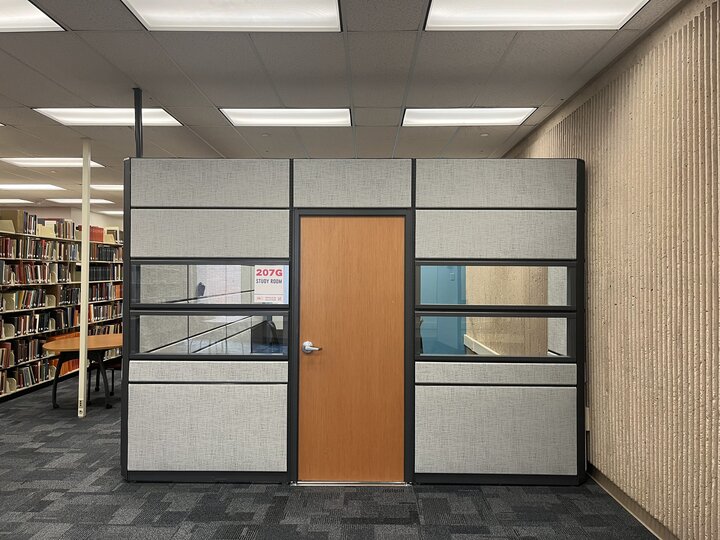 Photo of the cubicle walls of room 207G in Love Library