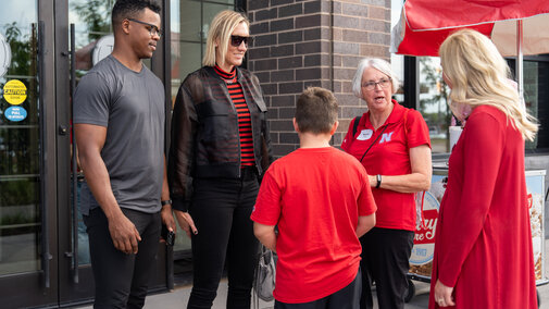 Professional volleyball player Jordan Larson with attendees. 