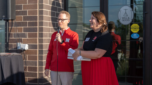 Andy Jewell, Chair and Liz Lorang, Dean pulling names for raffle prizes.