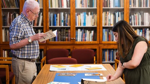 People viewing archives materials